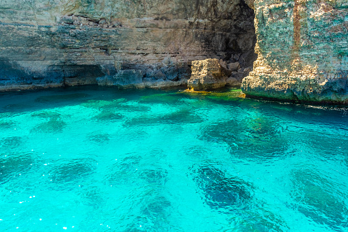 Crystal clear water under the cliffs of Malta