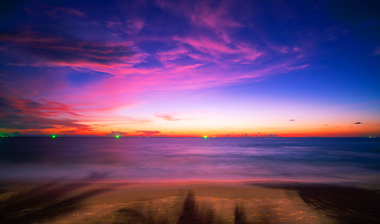 Sunset or sunrise sky clouds over sea sunlight in Phuket Thailand ,Amazing nature beach landscape seascape, Colorful sky background