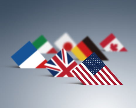 G7 summit (economic political concept). Flags of seven member countries on the world map. Usa, Canada, Germany, Italy, Great Britain, Japan, France as partners of meeting. 3d illustration