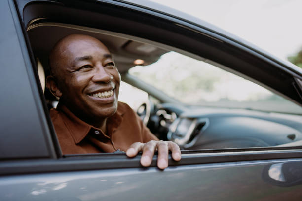 istock Passenger in car mature man looking at view 1473501989