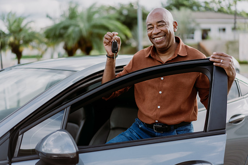 Holding new car key