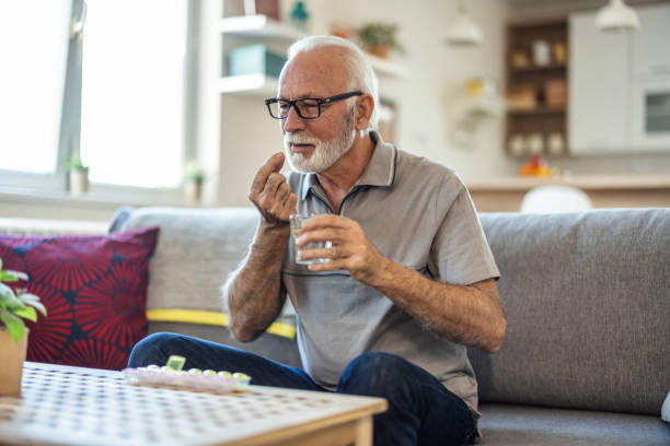 istock Man feels depressed, taking drugs. 1473503495
