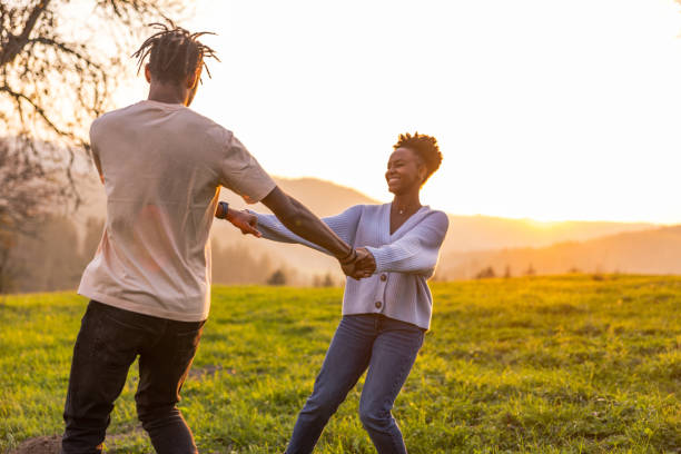 istock Lovely Hispanic Couple Dancing On A Countryside 1473503618