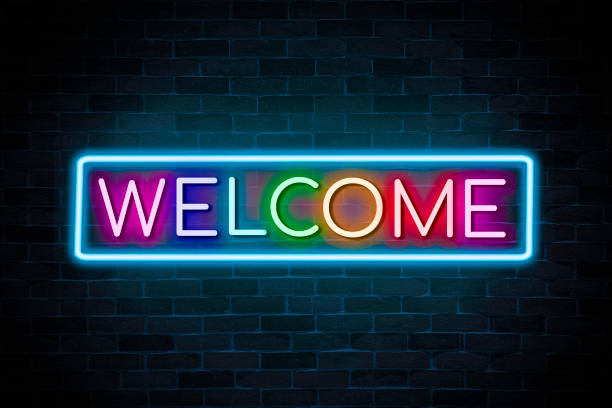 istock Welcome text neon banner on brick wall background. 1473503911
