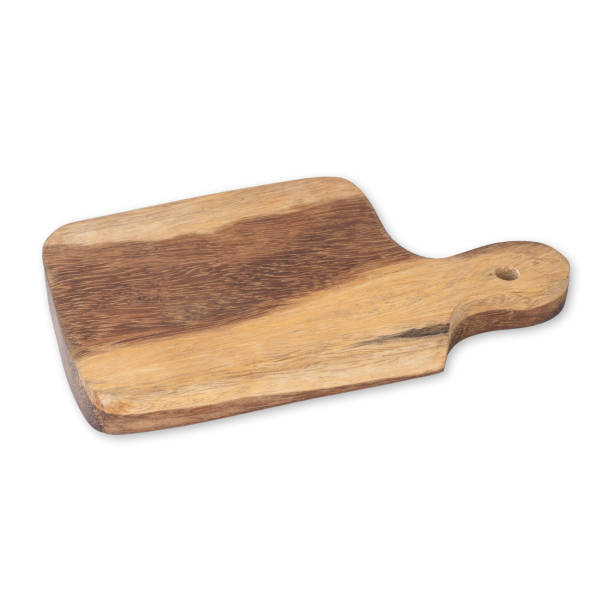 istock Wooden cutting board isolated over white background 1473505550