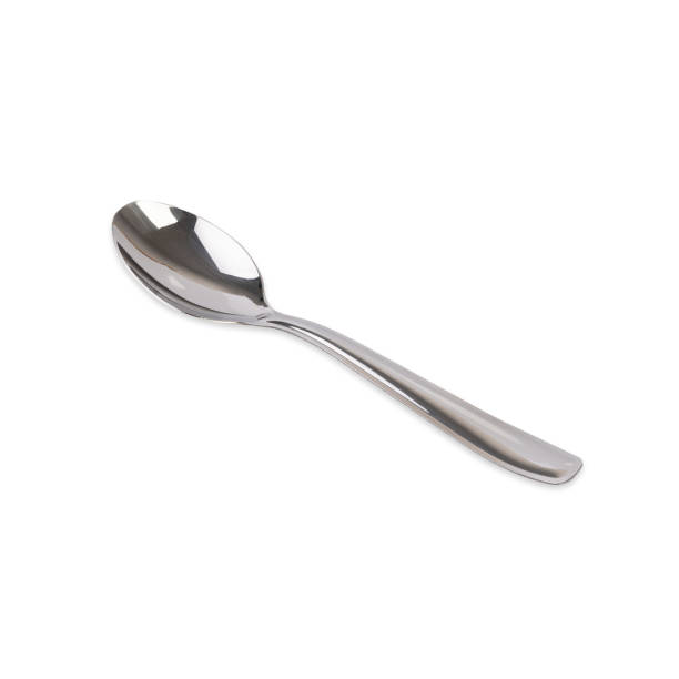 istock Metal spoon isolated over white background 1473505582
