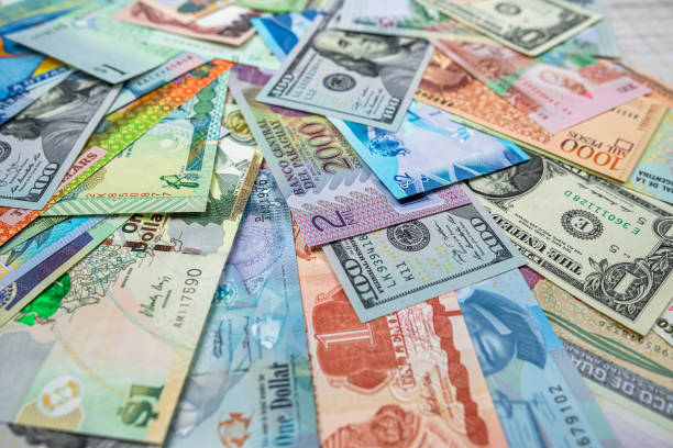istock different South central and north American money background 1473505749