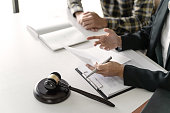Lawyer and client negotiation in legal judgement consulting.