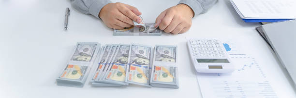 istock Financial inspector calculating a numbers in office room, Selected focus. 1473507919