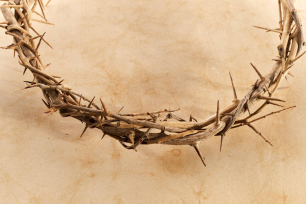 istock Crown Of Thorns On Vintage Paper Background 1473508128