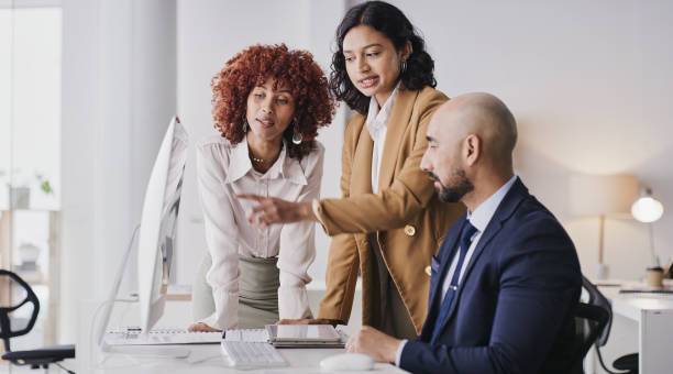 istock Administration computer, collaboration or business people point at financial diversity funding, finance or online accounting. Fintech database, data analysis or accountant teamwork on bank compliance 1473508659