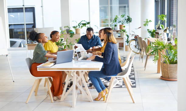 istock Creative business, people and discussion for collaboration, teamwork and planning in office. Diversity group, happy designers and meeting in company for strategy, startup innovation and project ideas 1473510733