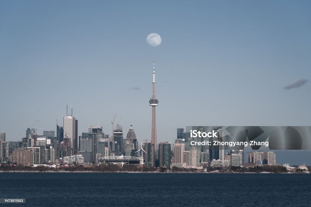 Moon on the CN Tower This is an alignment in March, a minor phenomenon in our daily life! Toronto Stock Photo