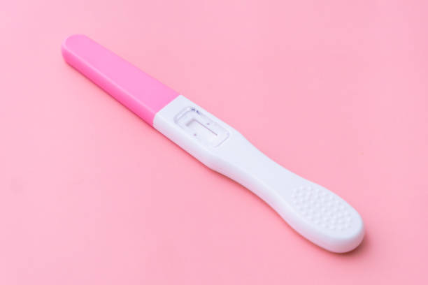 istock Pregnancy test isolated on the pink background 1473512263