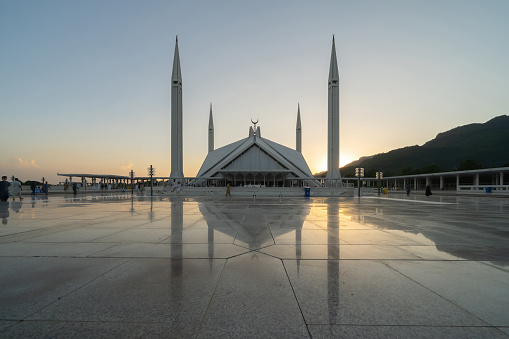 Faisal Mosque. The largest mosque in Islamabad, Pakistan. Muslim or Islamic white architecture building. Landmark tourist attraction.