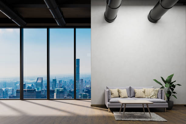 istock large urban skyline loft office with white wall and canvas mock up; copy space panoramic window skyline view, 3D Illustration 1473514789