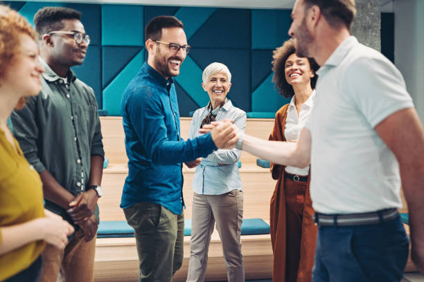 istock Businessmen greeting in the office 1473515918