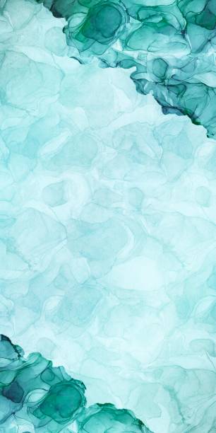 istock Paper-like texture and green marbled waves. Alcohol ink art vertical abstract template 1473522539
