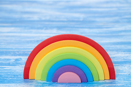 LGBT gay pride Rainbow on a blue sky background.