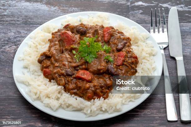 Chilli Con Carne Served With White Long Grain Rice Stock Photo - Download Image Now - Kidney Bean, American Culture, Bean