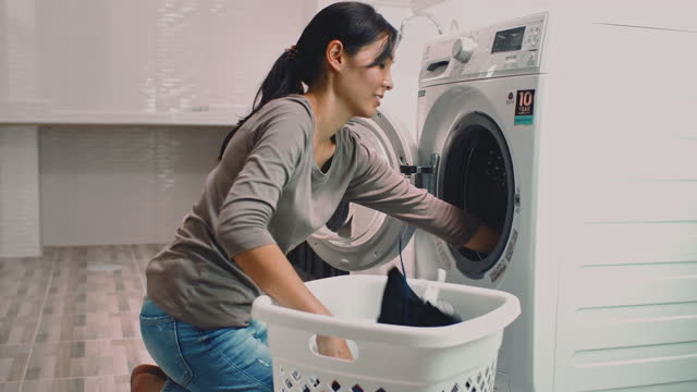 woman doing laundry at home