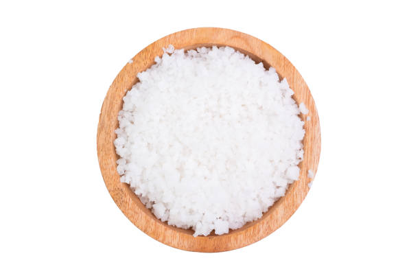 istock Sea salt in a bowl on a white background 1473530683