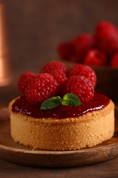 istock dessert tartlet with fresh organic raspberries 1473531472