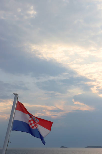 istock Croatian Flag and Sunset 1473532742