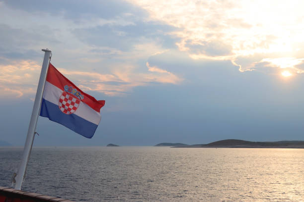 istock Croatian Flag and Sunset 1473532744