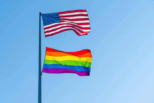 istock Low Angle View Of Flags Against Clear Blue Sky 1473532885