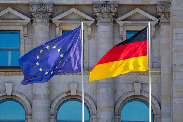 istock Low Angle View Of Flags Against Building 1473532888