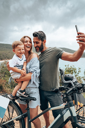 happy bikers family take a selfie