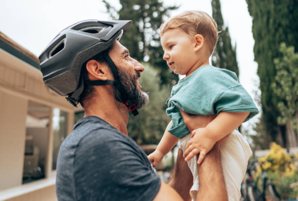 istock man carrying the son on the sky 1473536178