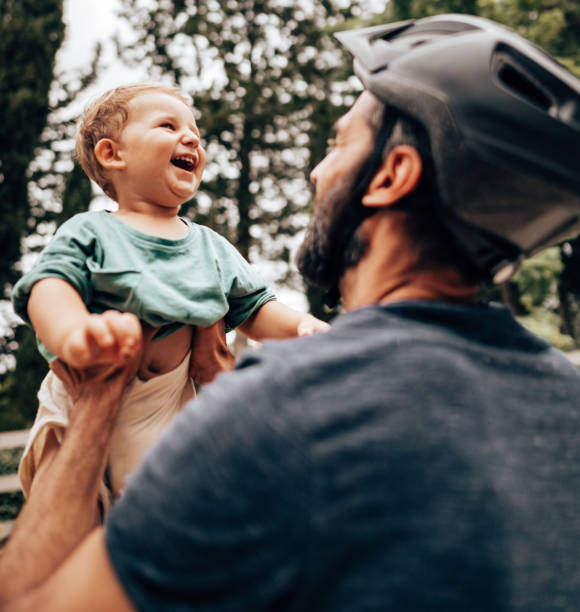 istock man carrying the son on the sky 1473536219