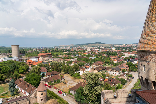 Hateg, Romania - 3 July 2022: High angle view from the Corvin (Hunyadi) Castle down on the city of Hateg that lies in the hart of Transylvania. Romania.