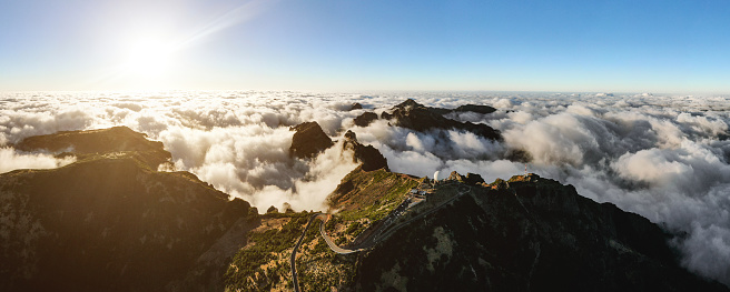 Peaks of mountains over the clouds. Madeira pinnacles panorama. Top view