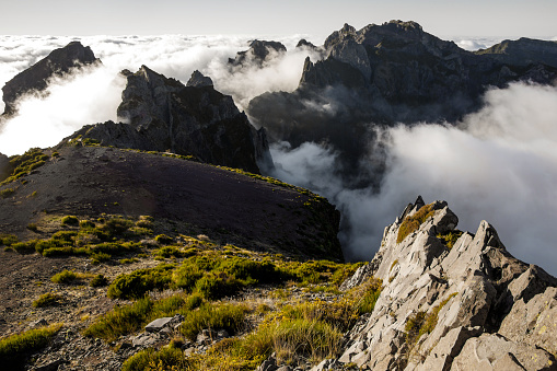 Peaks of mountains over the clouds. Madeira pinnacles panorama.