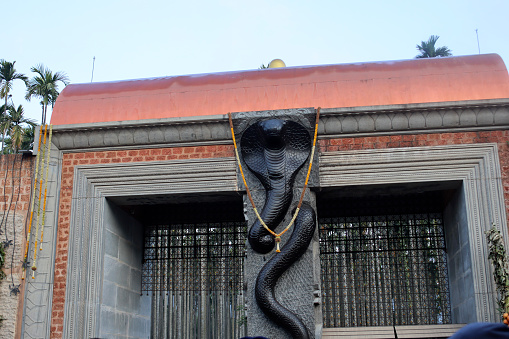 Dhyanlinga entrance of the main temple with huge snake