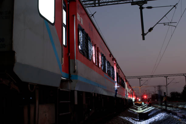 Train at night on railroad station