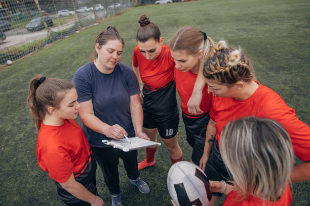istock Female rugby players on time out 1473543440