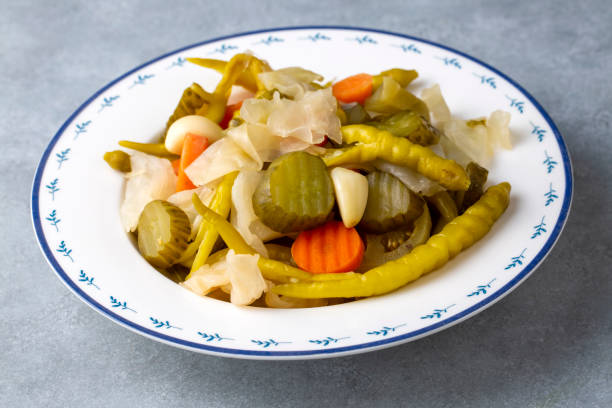 istock Assorted mixed pickled vegetables in bowl - plate, Turkish name; tursu. 1473547902