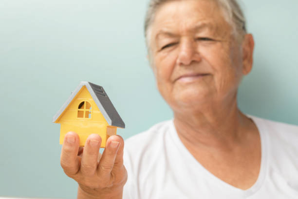 istock House in Human Hand 1473548858