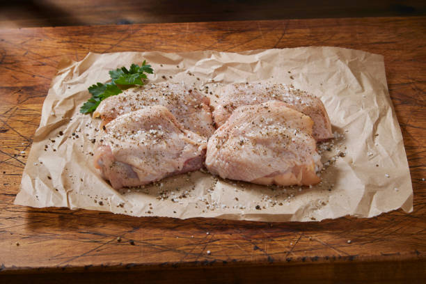 istock Raw Organic Chicken Thigh's 1473551627