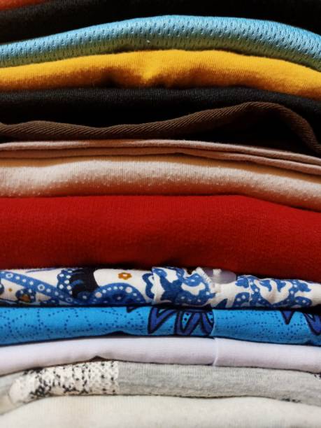 istock A pile of assorted ironed and folded clothes 1473555370