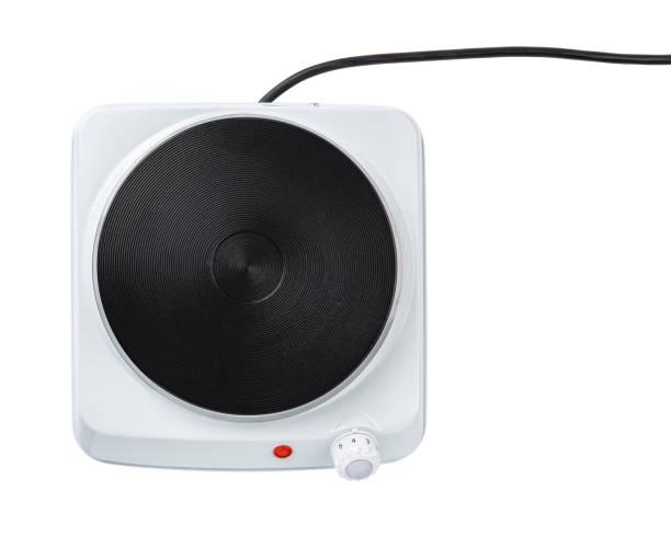 istock Single burner portable cooktop cutout. Hot plate for cooking isolated on a white background. Compact electric burner with temperature adjustment knob. Home appliances concept. 1473556668
