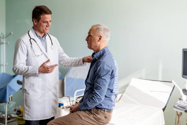 istock Mature man talking with psychotherapist in his office 1473559492