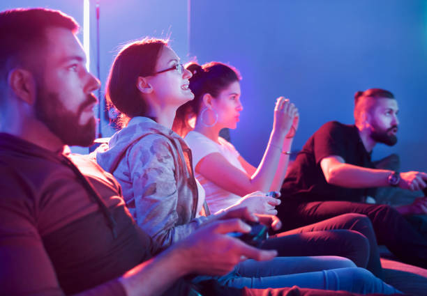 istock Friends playing video games on game console 1473559648