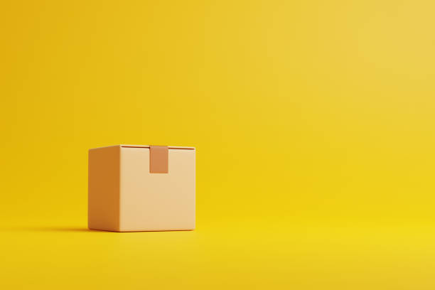 istock Single brown cardboard box on a yellow background 1473560652