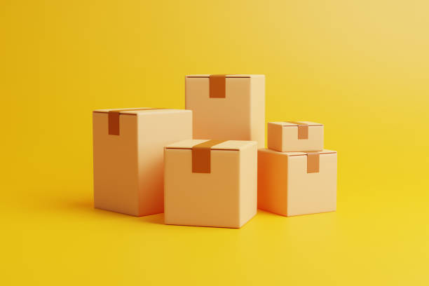 istock A group of brown cardboard boxes on a yellow background 1473560661