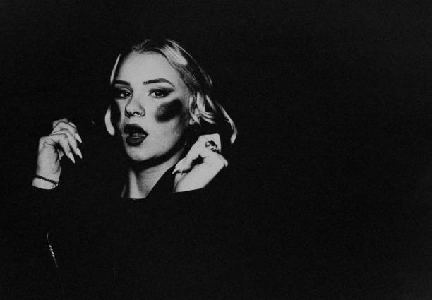 istock The modern young woman in the dark. 1473564251